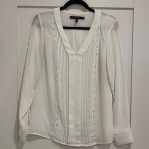 White House Black Market long sleeve v-neck blouse with silver grommets